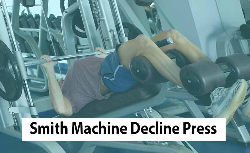 Handsome Man Doing Smith Machine Decline Bench Press In The Gym